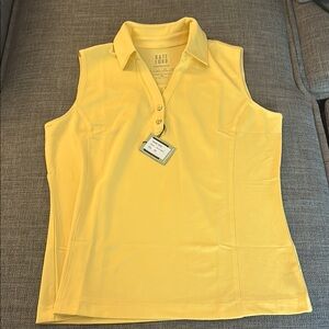 Kate Lord sleeveless golf shirt.